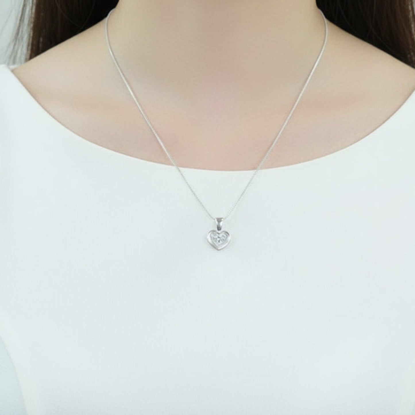 silver keepsake heart on model uk