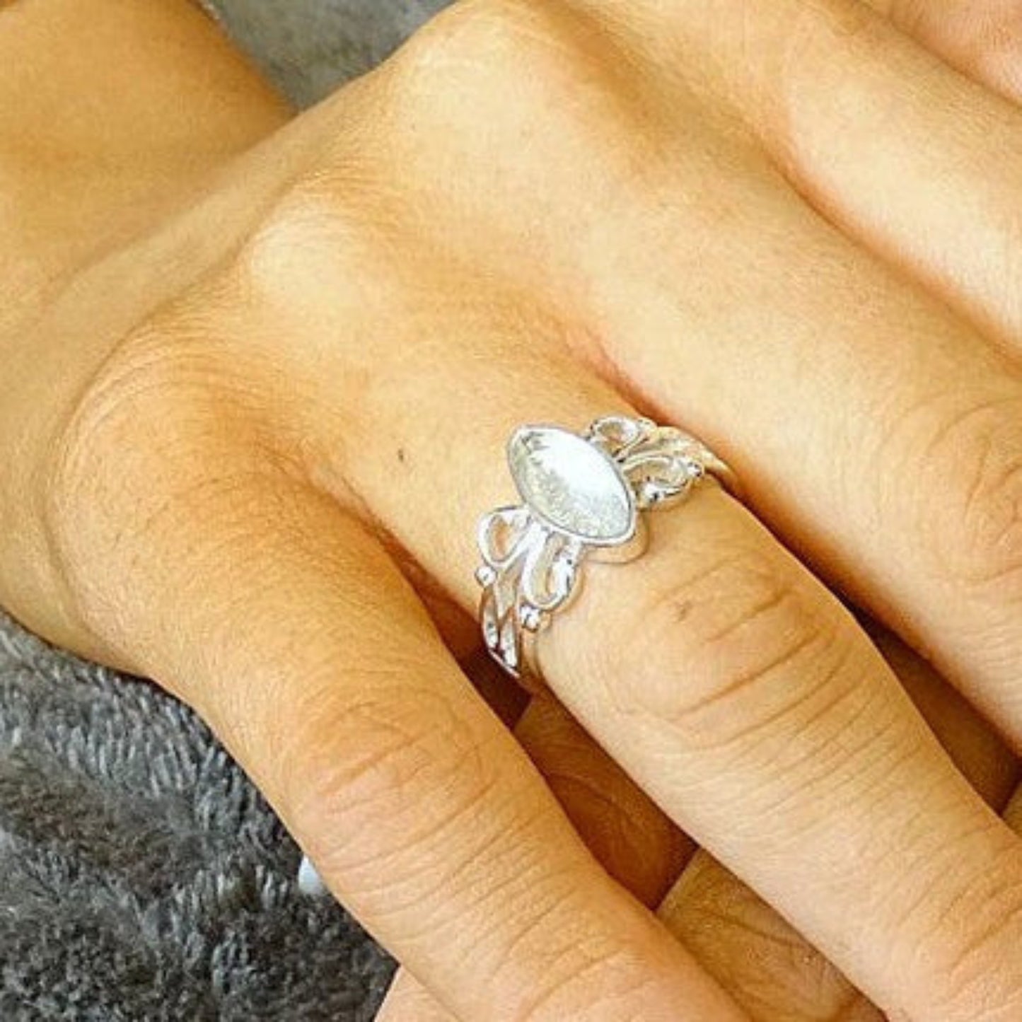 Willow Ring worn on hand — silver marquise ashes memorial ring, handcrafted in the UK