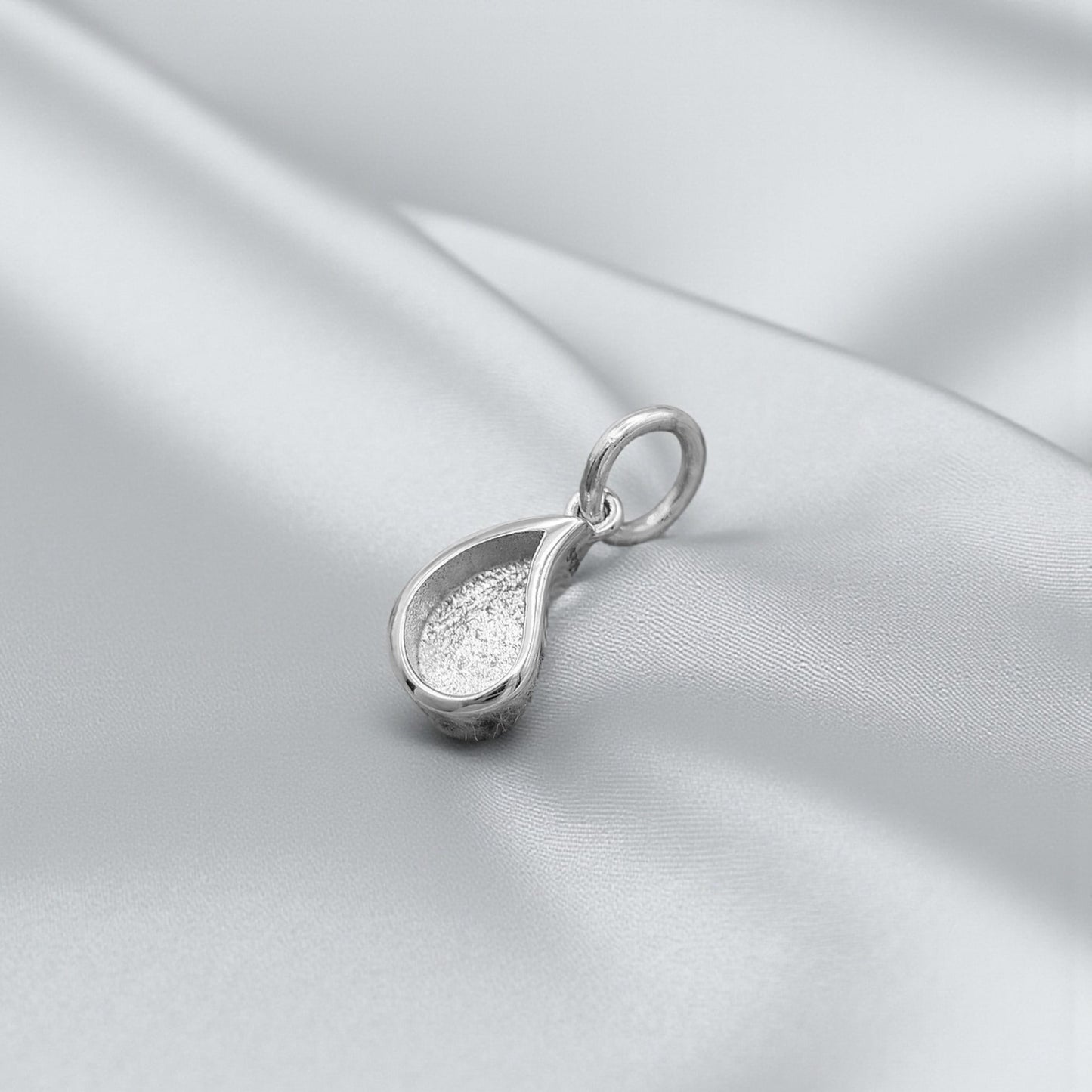 Silver milk drop keepsake pendant, handcrafted in Lancashire, UK