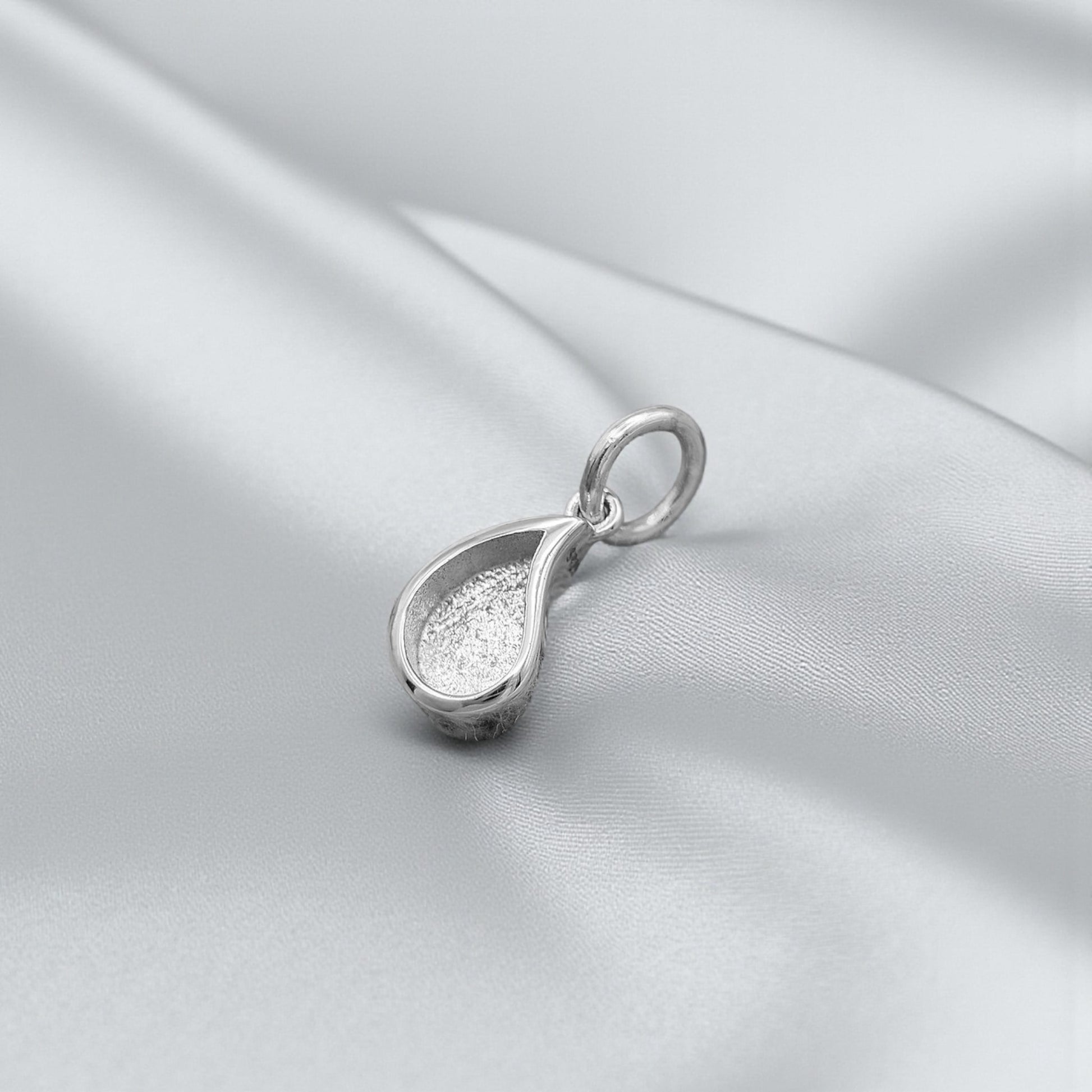Silver milk drop keepsake pendant, handcrafted in Lancashire, UK