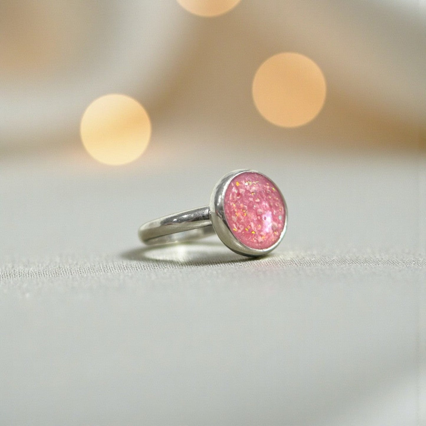 Arcadia Ring worn on hand — silver oval keepsake ashes memorial ring, handcrafted in the UK