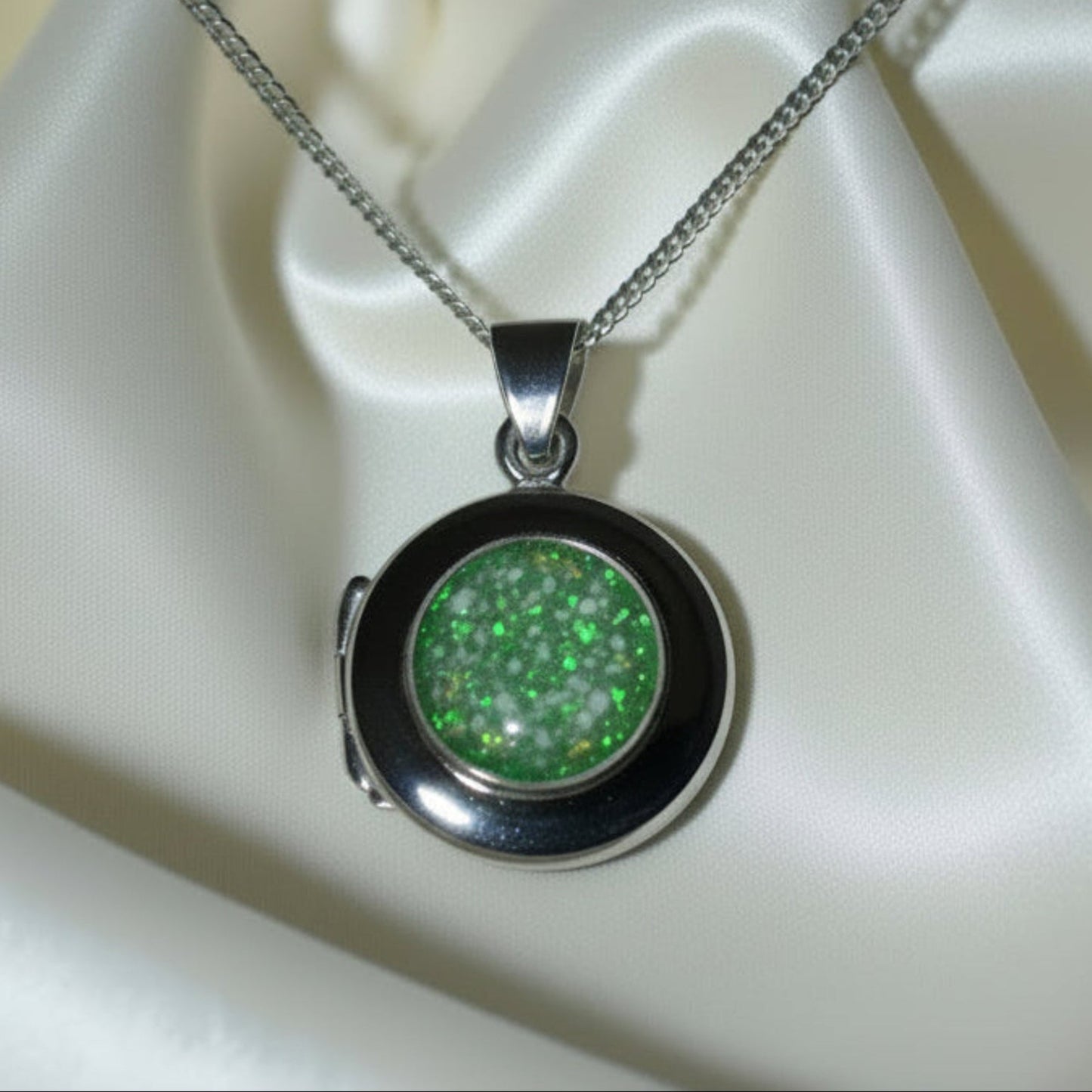 silver round memorial locket