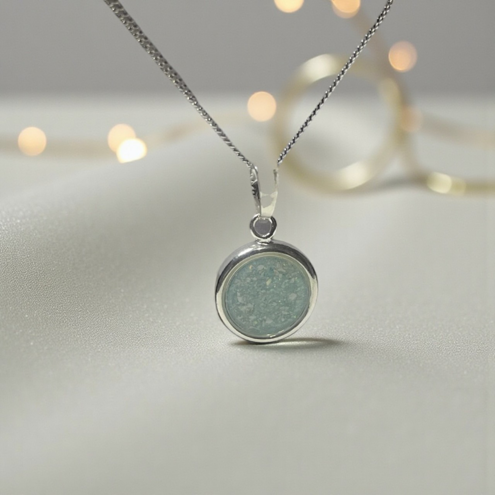 silver round ashes memorial pendant, handcrafted in lancashire