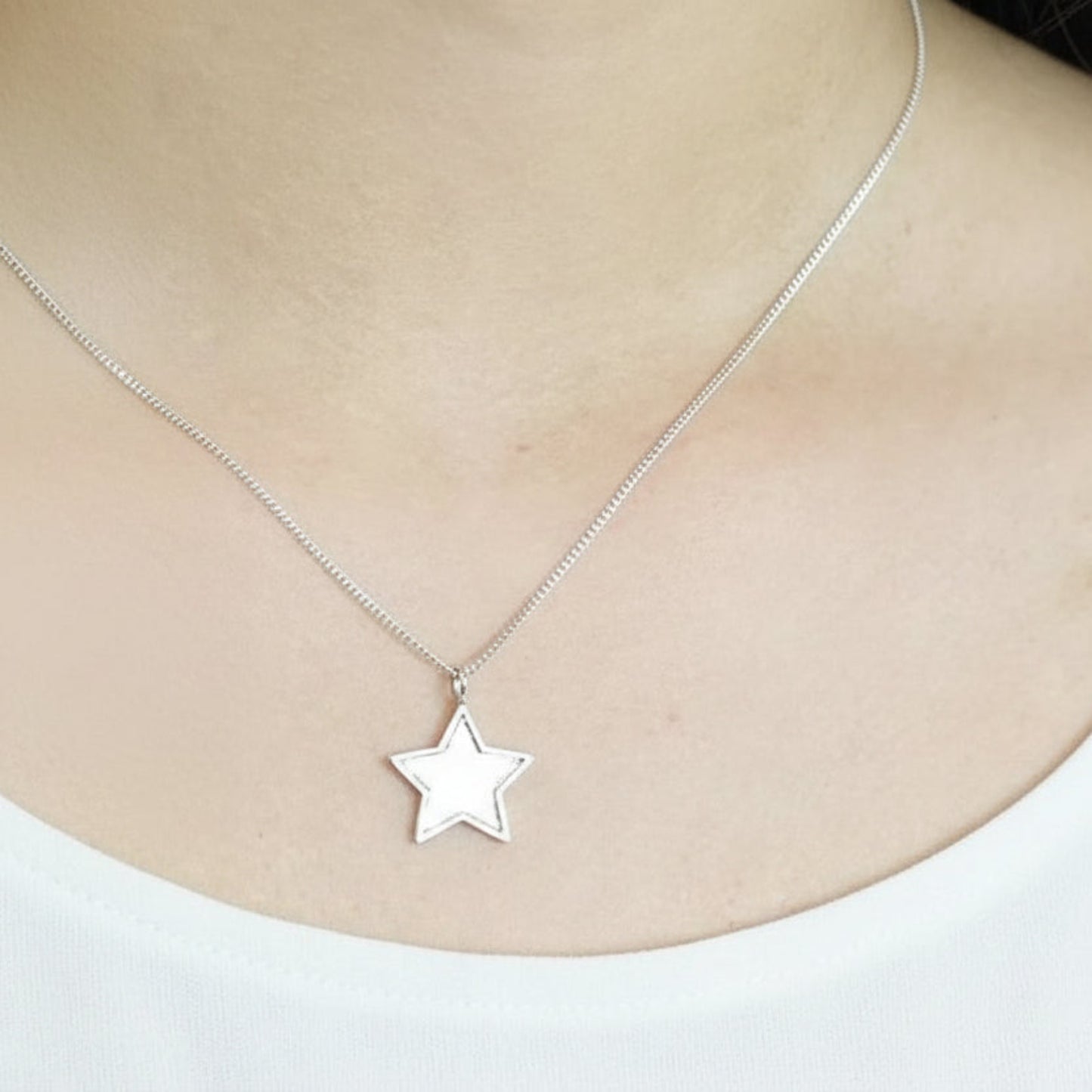 silver star memory pendant on model uk
