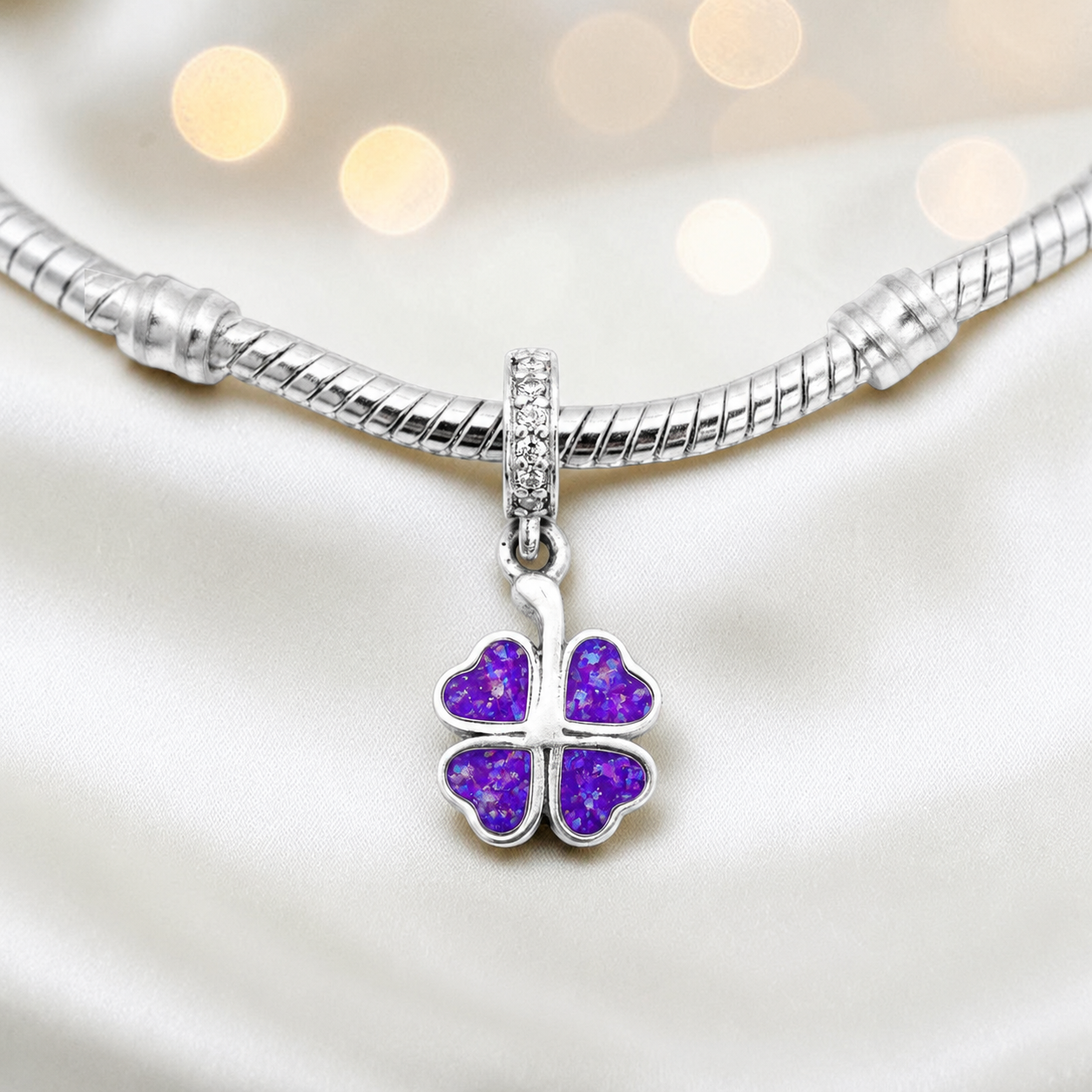 Sleepy lavender sterling silver clover dangle ashes memorial charm, handcrafted in Lancashire by keepsake memorial