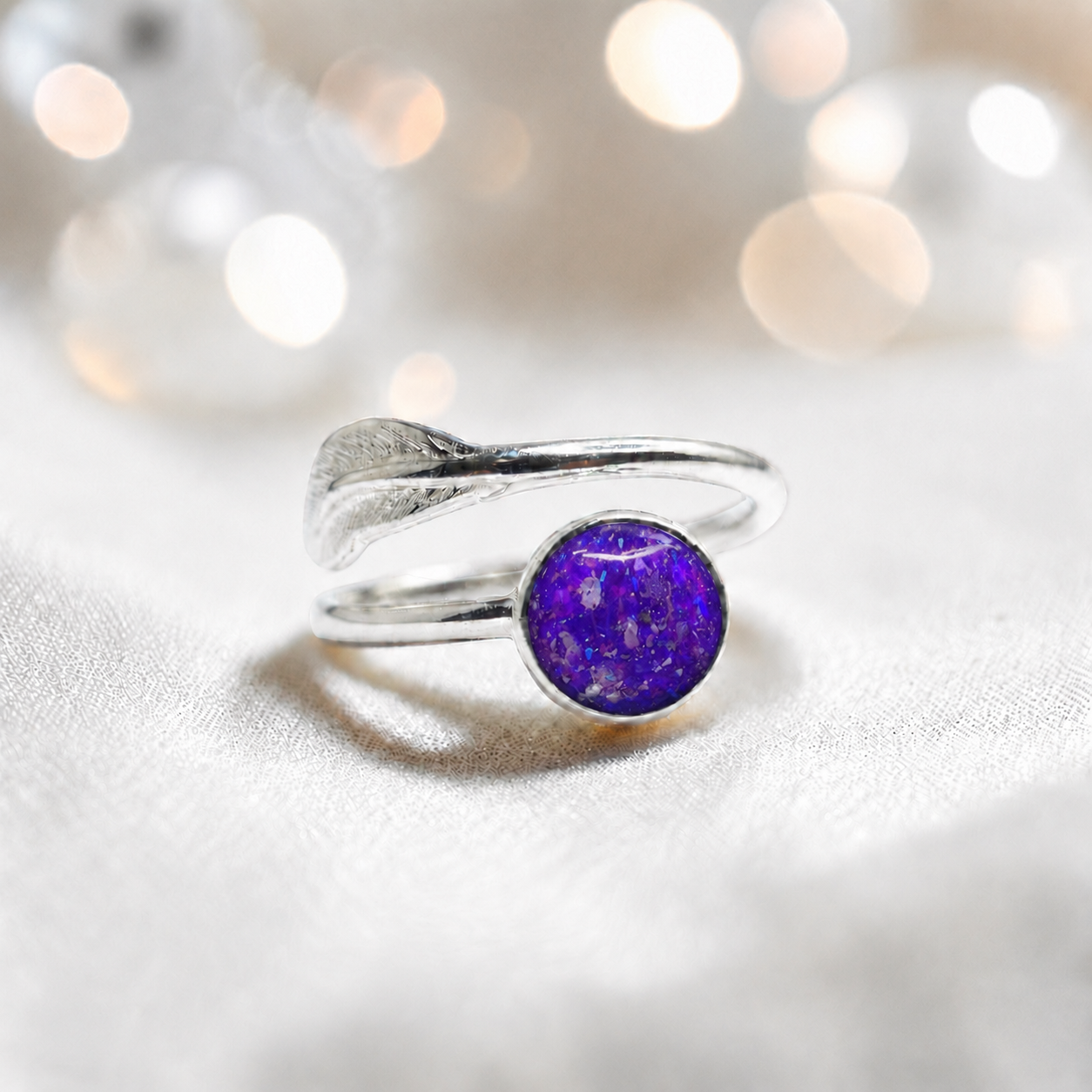 Feather Whisper Ring — silver feather ashes memorial ring, in sleepy lavender, handcrafted in Lancashire, UK