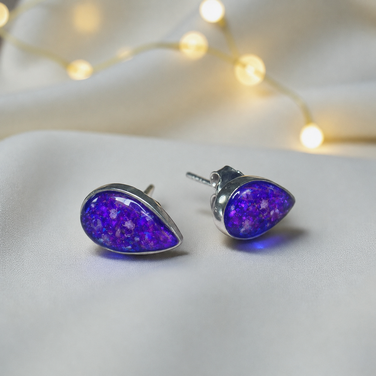 Pure Radiance memorial earrings in Sleepy Lavender opal — sterling silver, handcrafted in Lancashire, UK