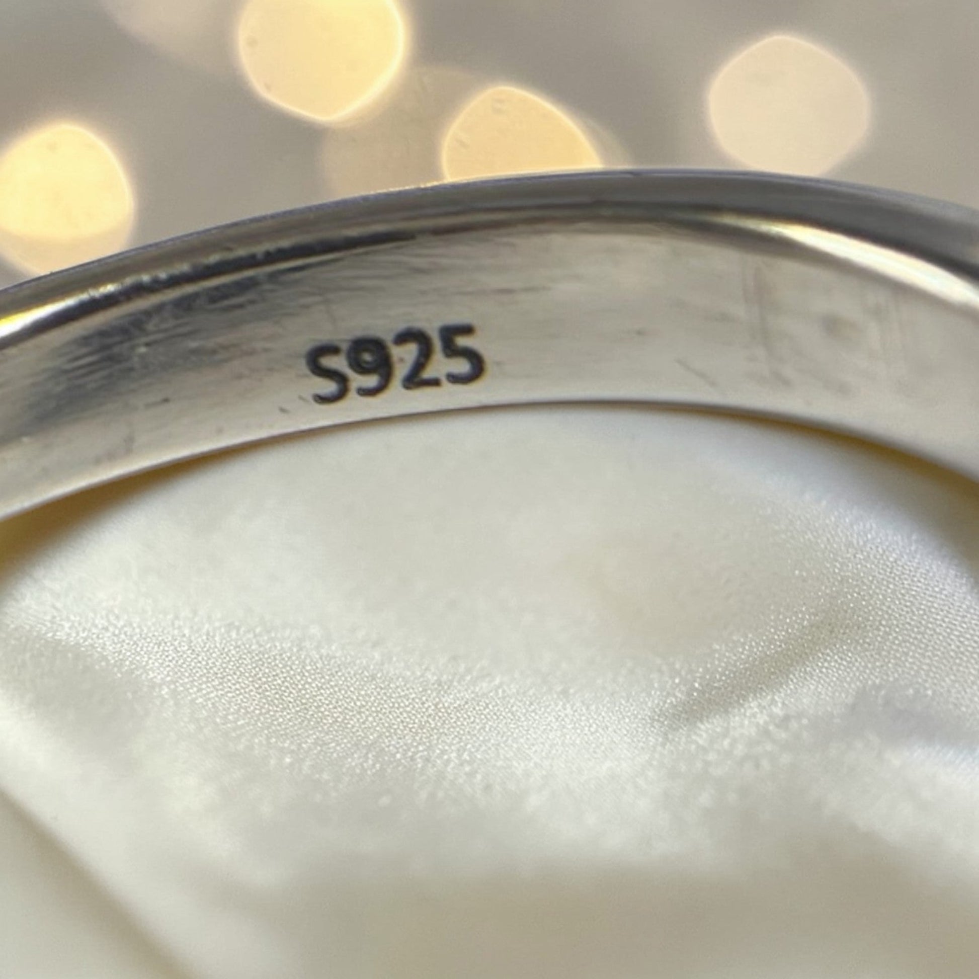 silver stamp on wishbone ring, uk