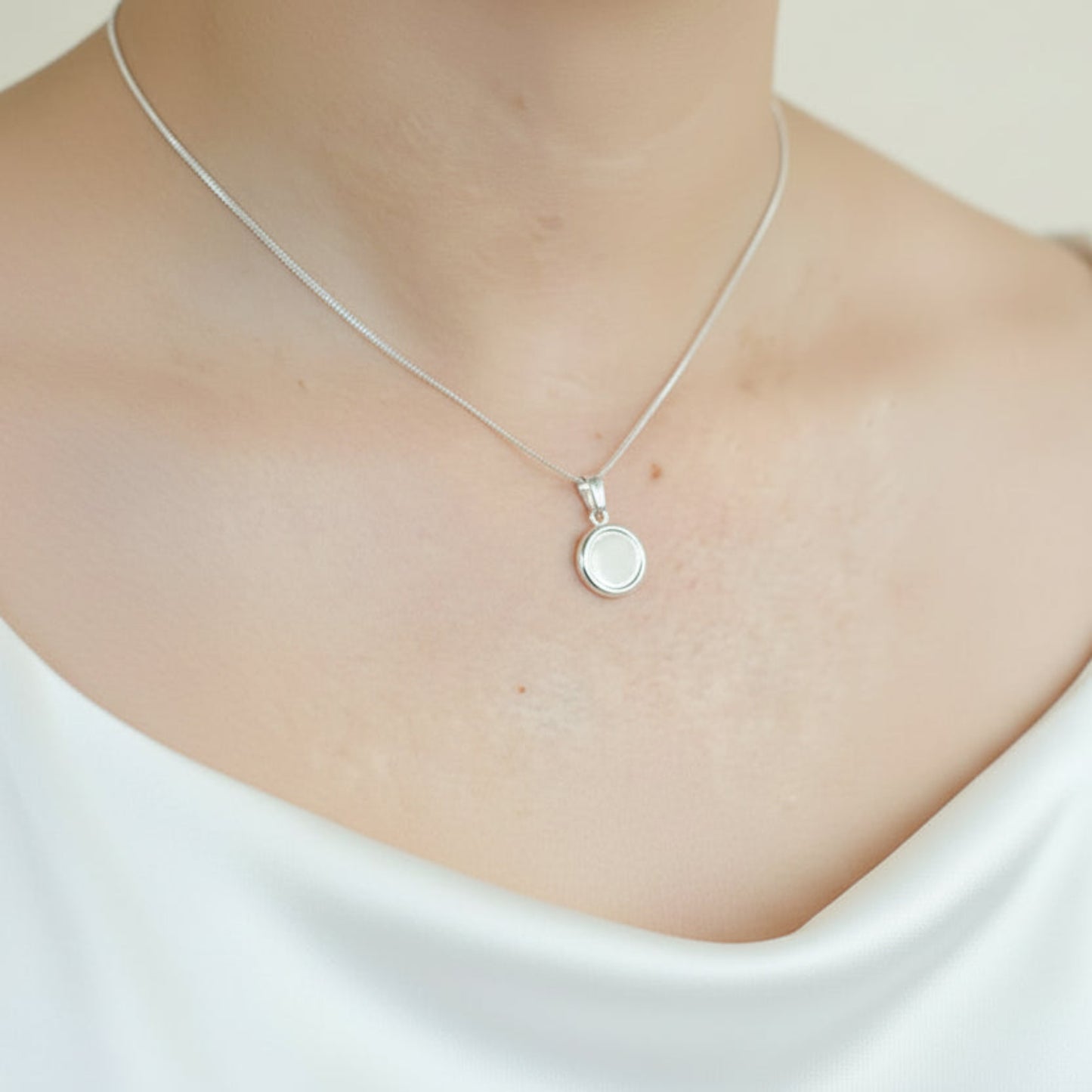 silver round keepsake pendant uk