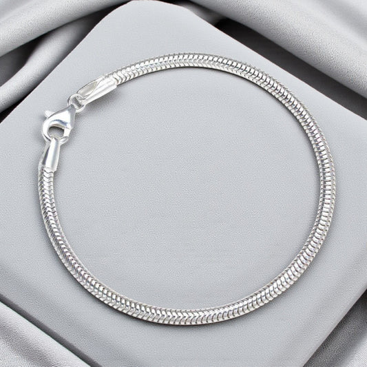 Silver snake charm bracelet, handcrafted in Lancashire, UK