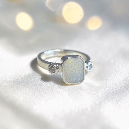 Keepsake Memorial Silver Anastasia Emerald Cut Ashes Ring in White Snow — handcrafted in Lancashire, UK