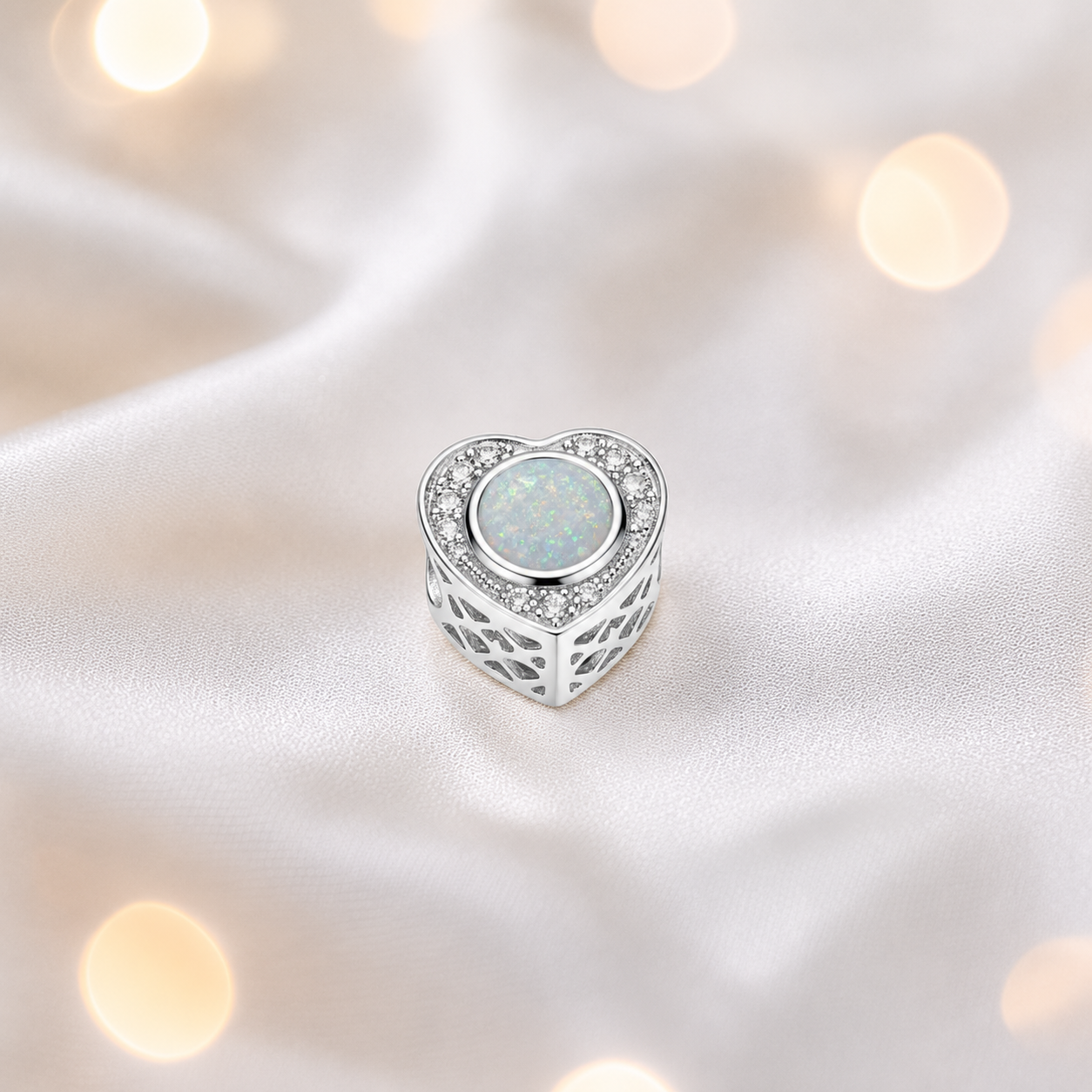 White snow sterling silver heart of memories ashes memorial charm, handcrafted in Lancashire by keepsake memorial