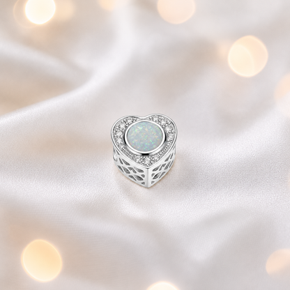 White snow sterling silver heart of memories ashes memorial charm, handcrafted in Lancashire by keepsake memorial