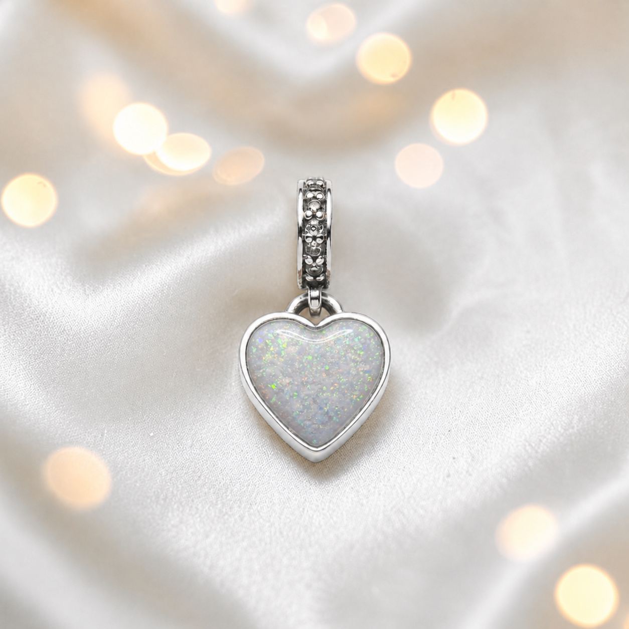 White snow sterling silver heavens heart ashes memorial dangle  charm, handcrafted in Lancashire by keepsake memorial