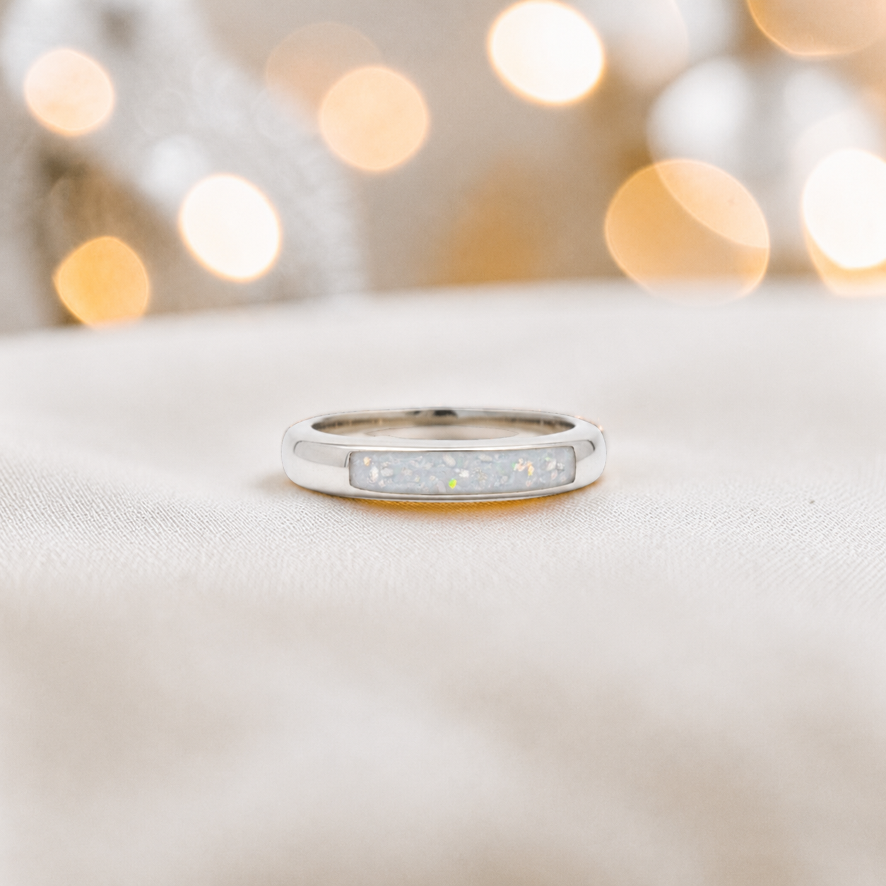 Keepsake Memorial Iris wishbone ashes ring in white snow, handcrafted in Lancashire 