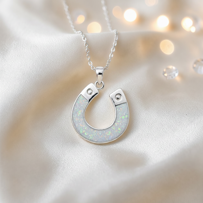 Midnight horseshoe ashes pendant in white snow,  handcrafted in Lancashire UK - by Keepsake Memorial Jewellery