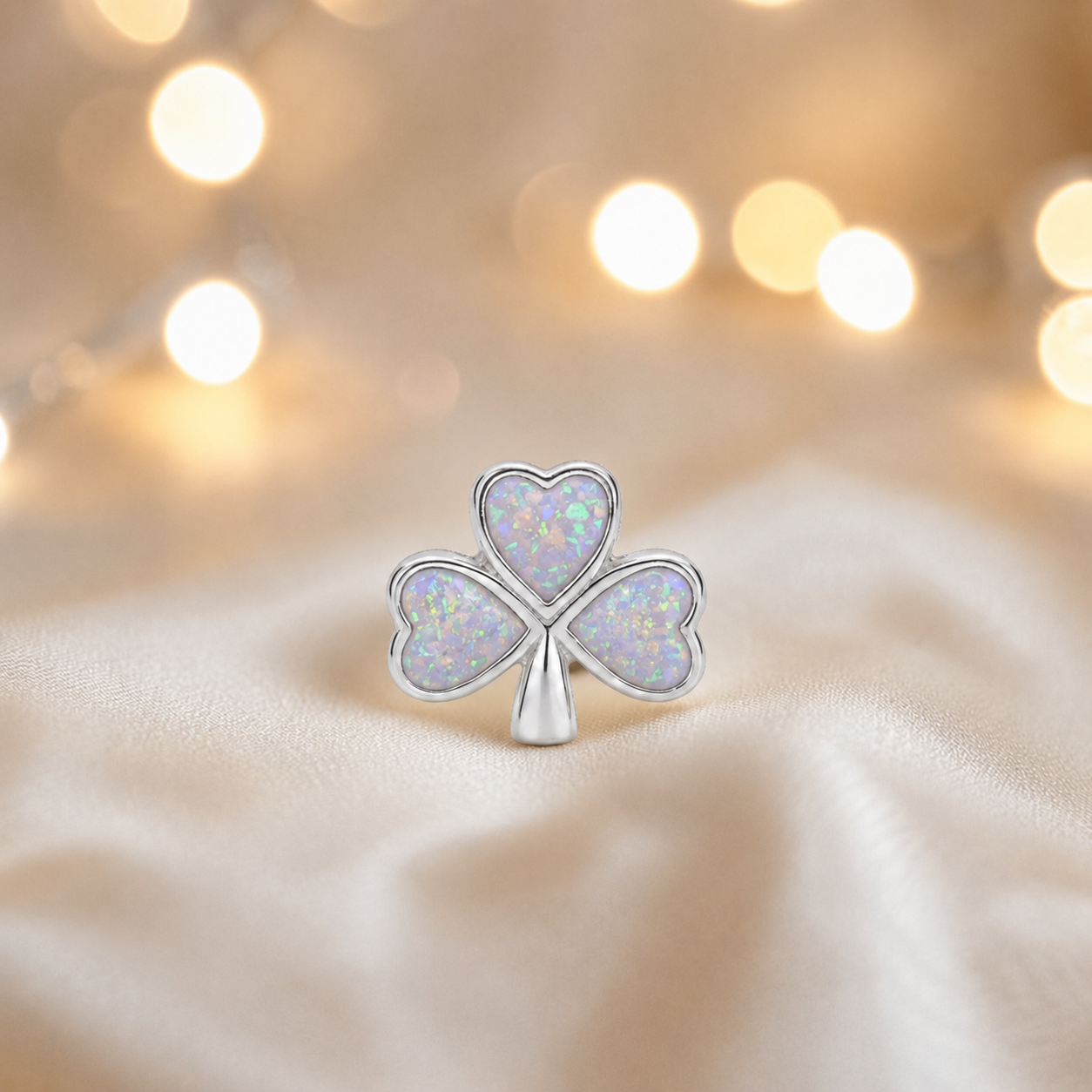 White snow sterling silver shamrock ashes memorial charm, handcrafted in Lancashire by keepsake memorial