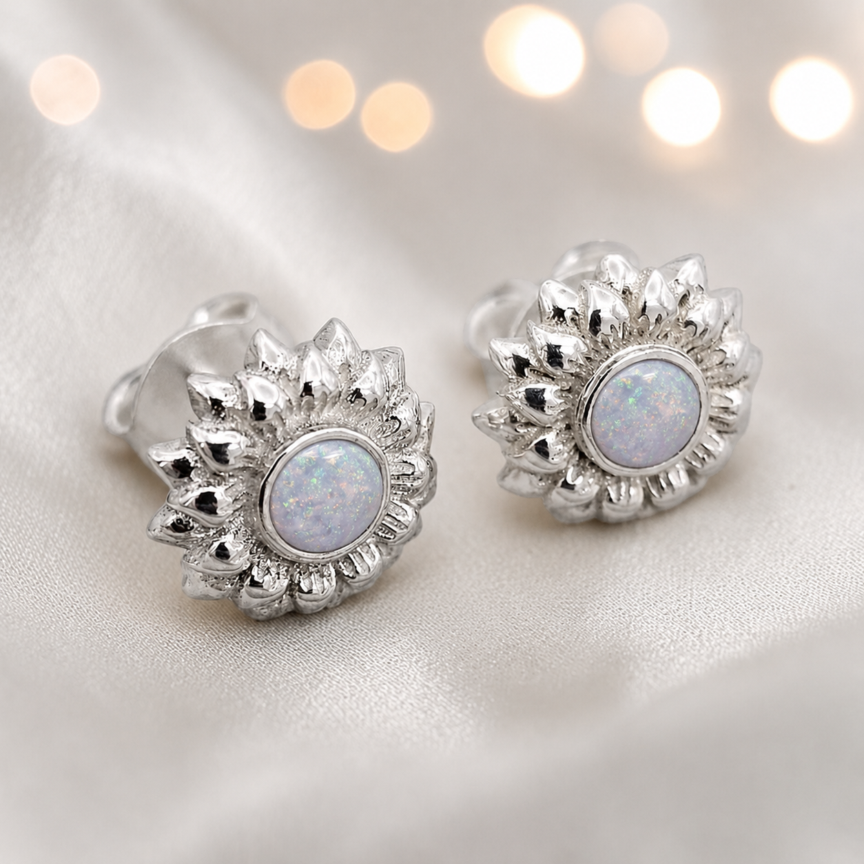Flora Earrings — silver sunflower ashes memorial stud earrings in White Snow resin, handcrafted in Lancashire, UK