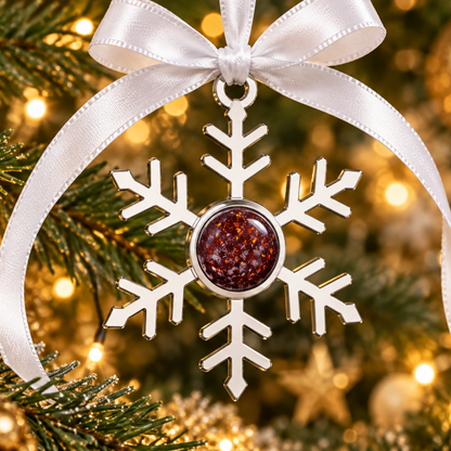 Stainless Steel Ruby red ashes snowflake ornament, handcrafted by Keepsake memorial jewellery in lancashire