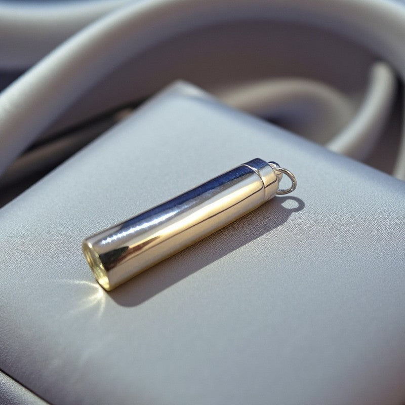 Men's urn pendant suitable for holding ashes, Lancashire, UK.
