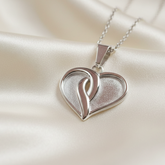 stainless steel crossover heart memorial pendant, handcrafted in lancashire 