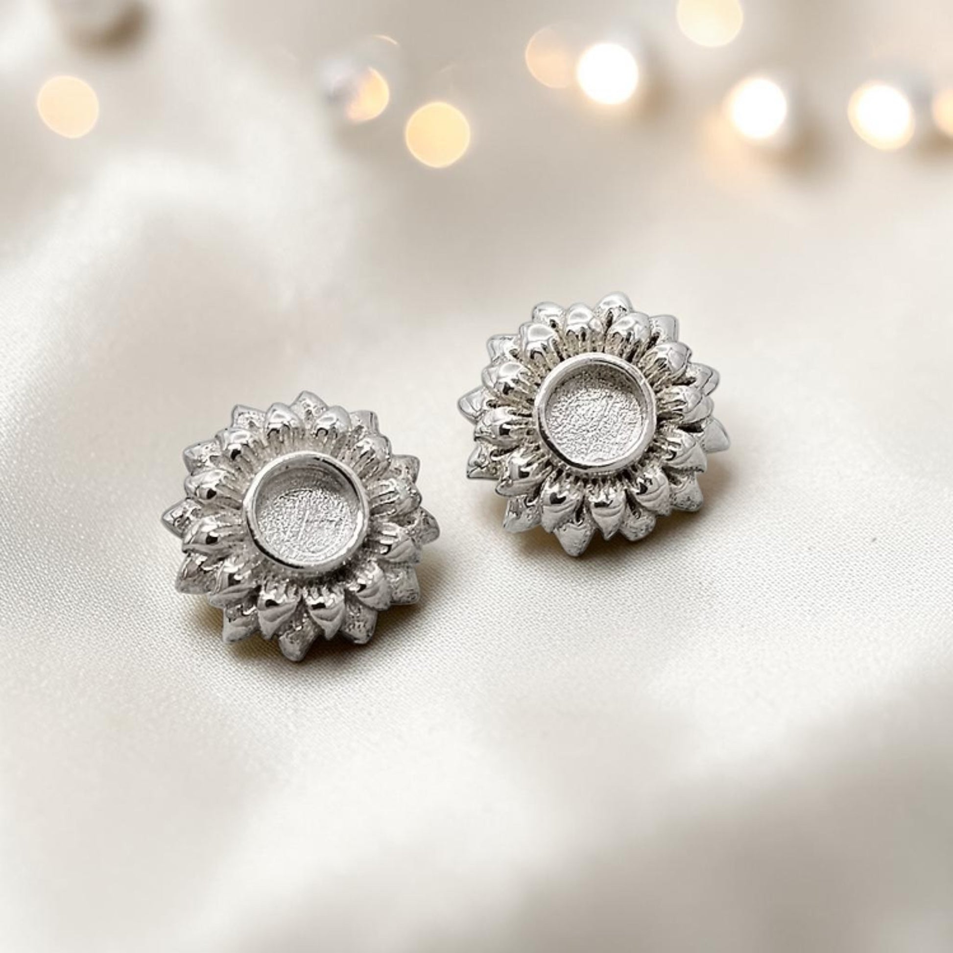 Flora Earrings — silver sunflower ashes memorial stud earrings, handcrafted in Lancashire, UK