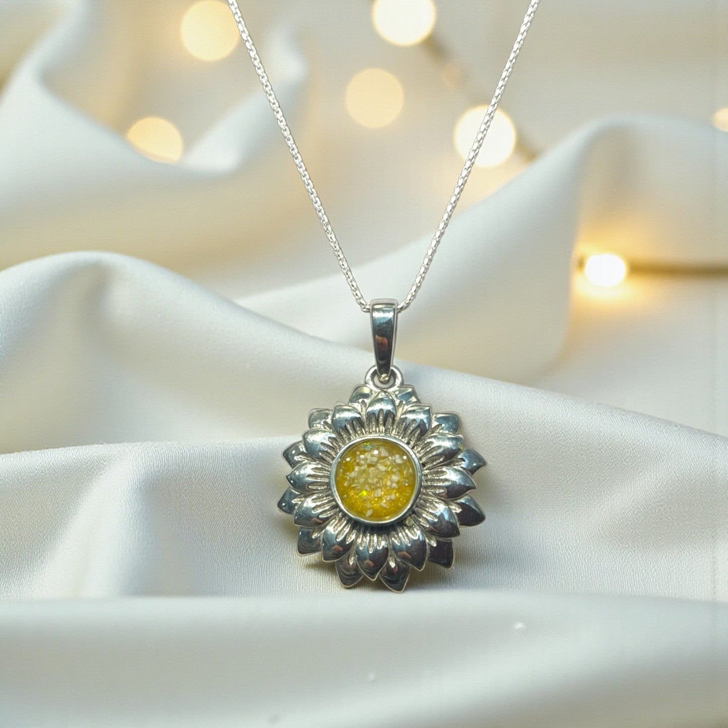 silver sunflower ashes pendant, handcrafted in lancashire