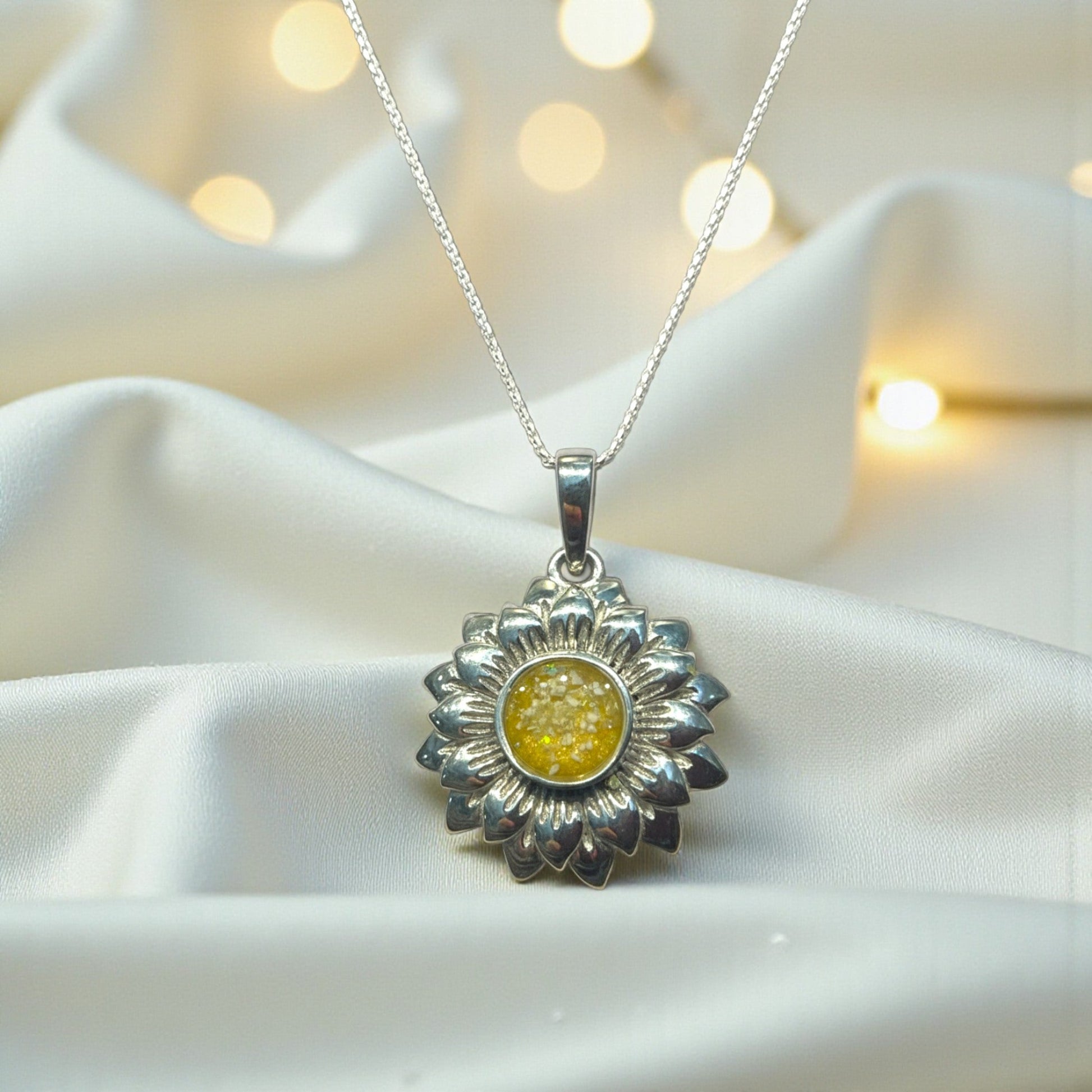 silver sunflower ashes pendant, handcrafted in lancashire