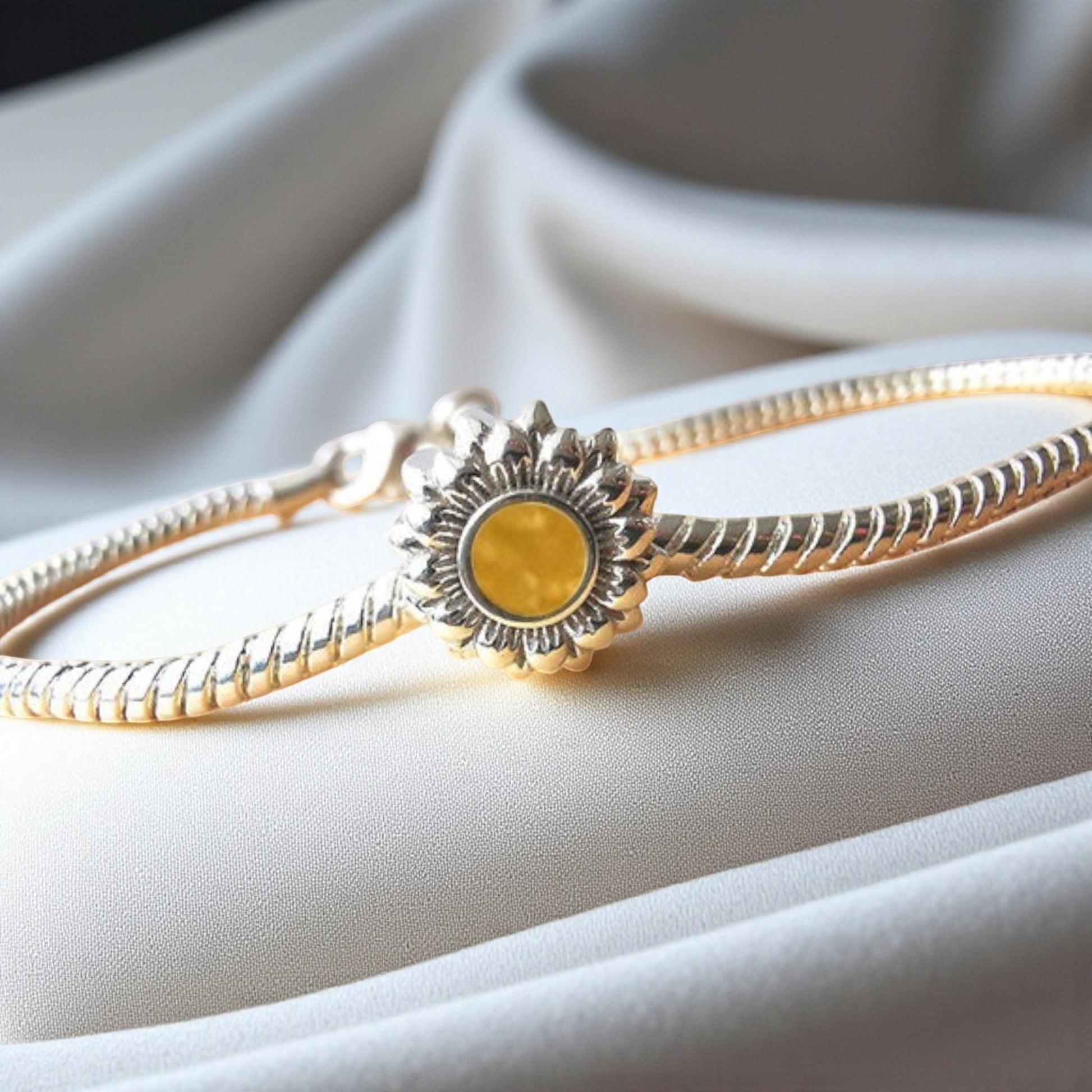 Silver sunflower memorial ashes charm, handcrafted in Lancashire, UK