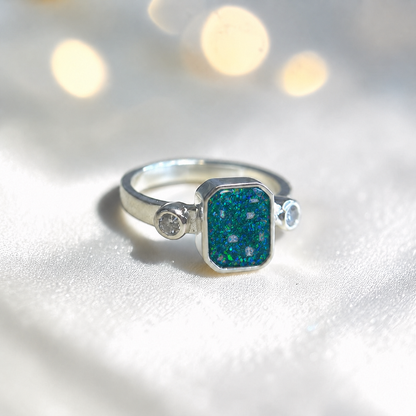 Keepsake Memorial Silver Anastasia Emerald Cut Ashes Ring in Teal Mist — handcrafted in Lancashire, UK