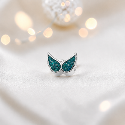 Teal Mist sterling silver angel wing ashes memorial charm, handcrafted in Lancashire by keepsake memorial