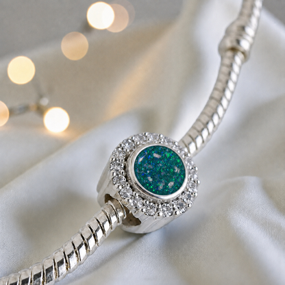 Teal mist sterling silver halo ashes memorial charm, handcrafted in Lancashire by keepsake memorial