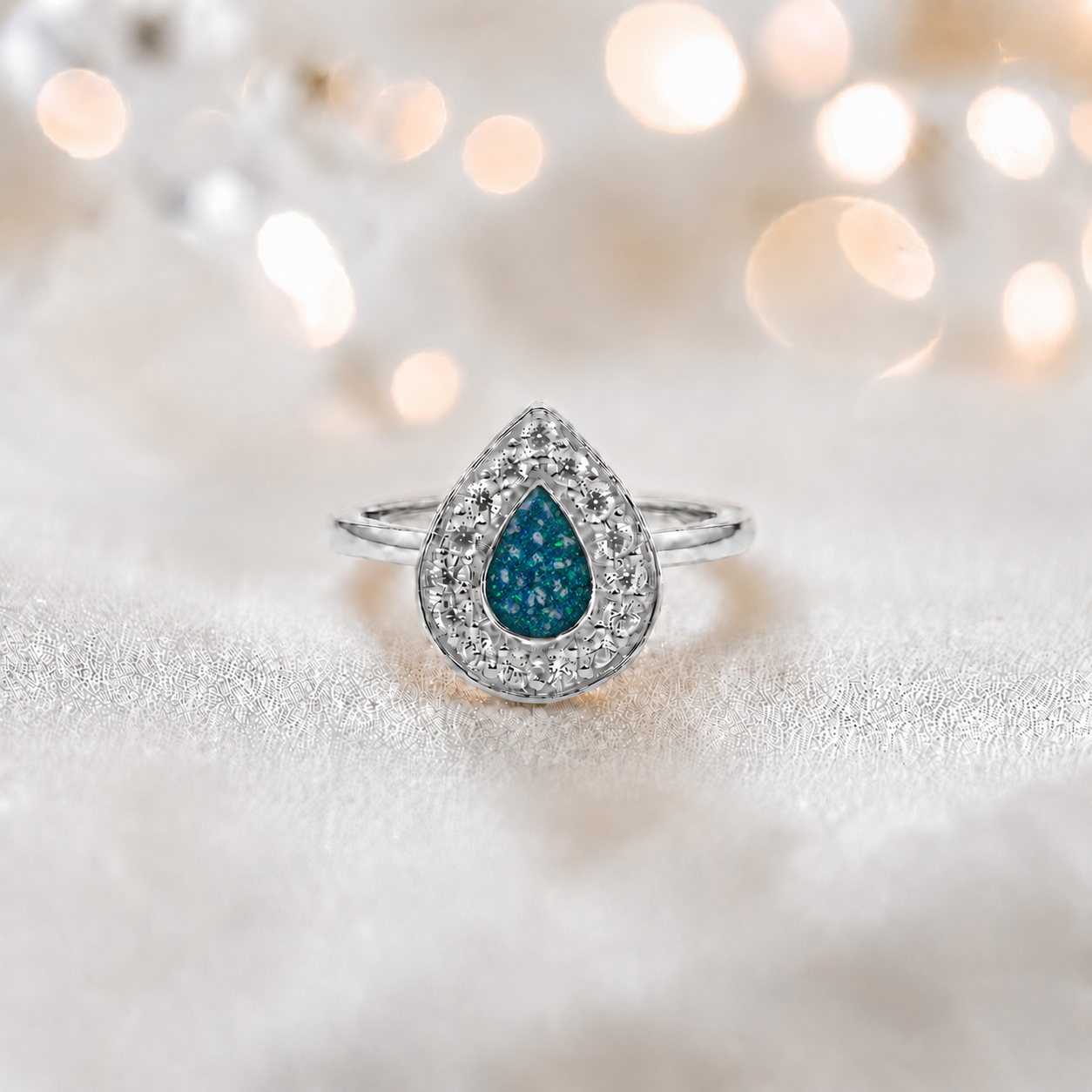 Keepsake Memorial Silver Helena Teardrop Ashes Ring in Teal Mist — handcrafted in Lancashire, UK