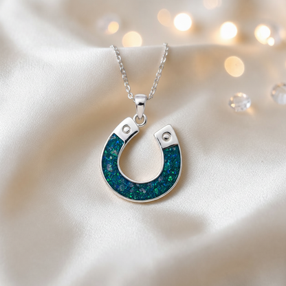 Midnight horseshoe ashes pendant in teal mist, handcrafted in Lancashire UK - by Keepsake Memorial Jewellery