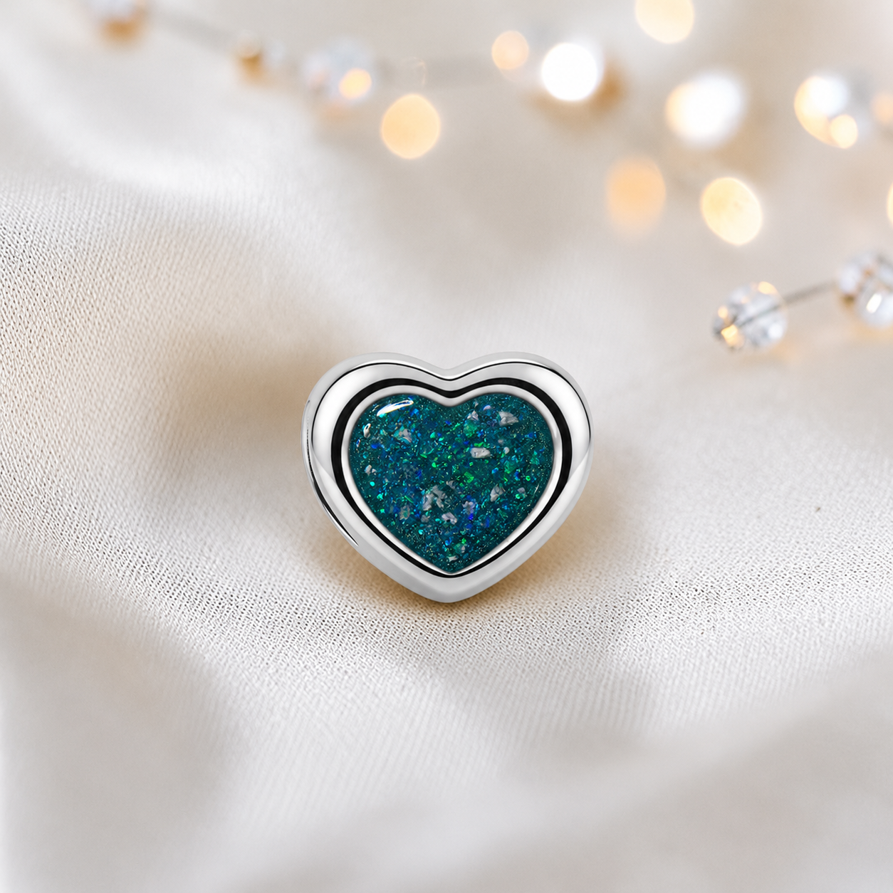 Teal mist sterling silver peaceful heart ashes memorial charm, handcrafted in Lancashire by keepsake memorial