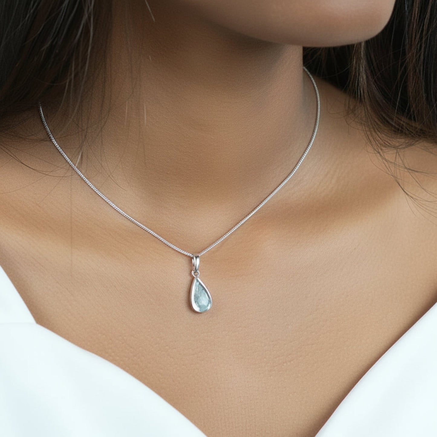 silver teardrop pendant on model, lancashire