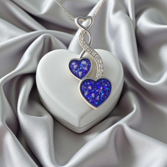Silver twin heart keepsake pendant, handcrafted in Lancashire, UK