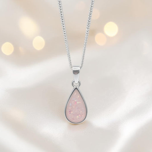 Vega sterling silver teardrop memorial pendant for holding ashes or hair, handcrafted in the UK
