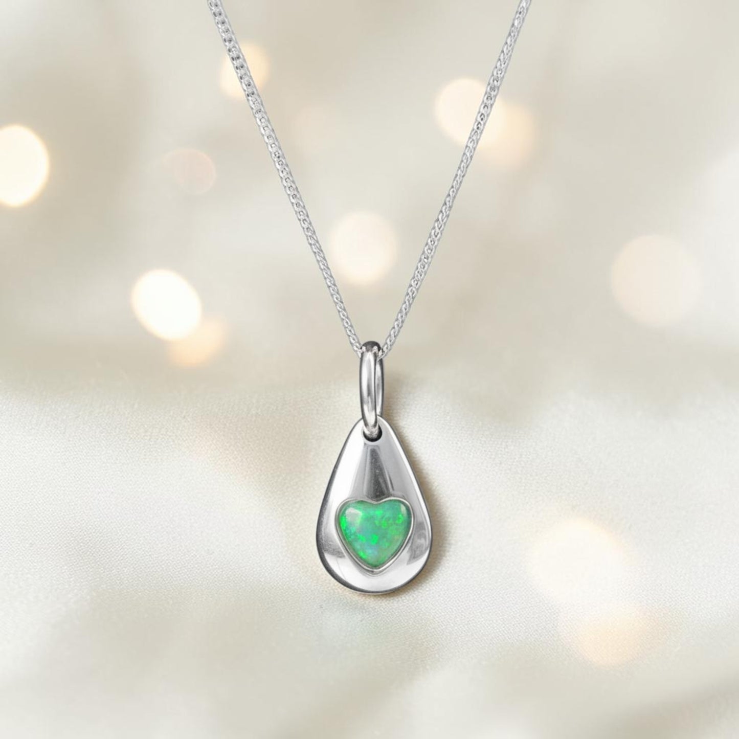 silver pebble ashes pendant handcrafted in lancashire, uk