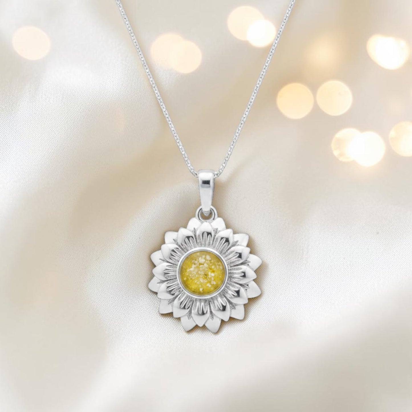 silver sunflower ashes pendant, handcrafted in lancashire