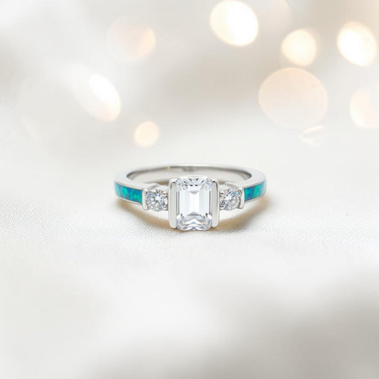 Ariel Ring — sterling silver emerald cut ashes memorial ring with vibrant shoulder settings, handcrafted in Lancashire, UK