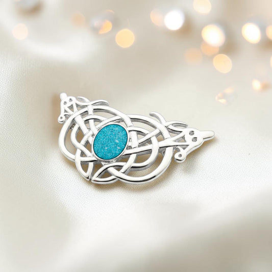Caledonia Brooch — silver Celtic ashes memorial brooch with blue opal centre setting, handcrafted in Lancashire, UK
