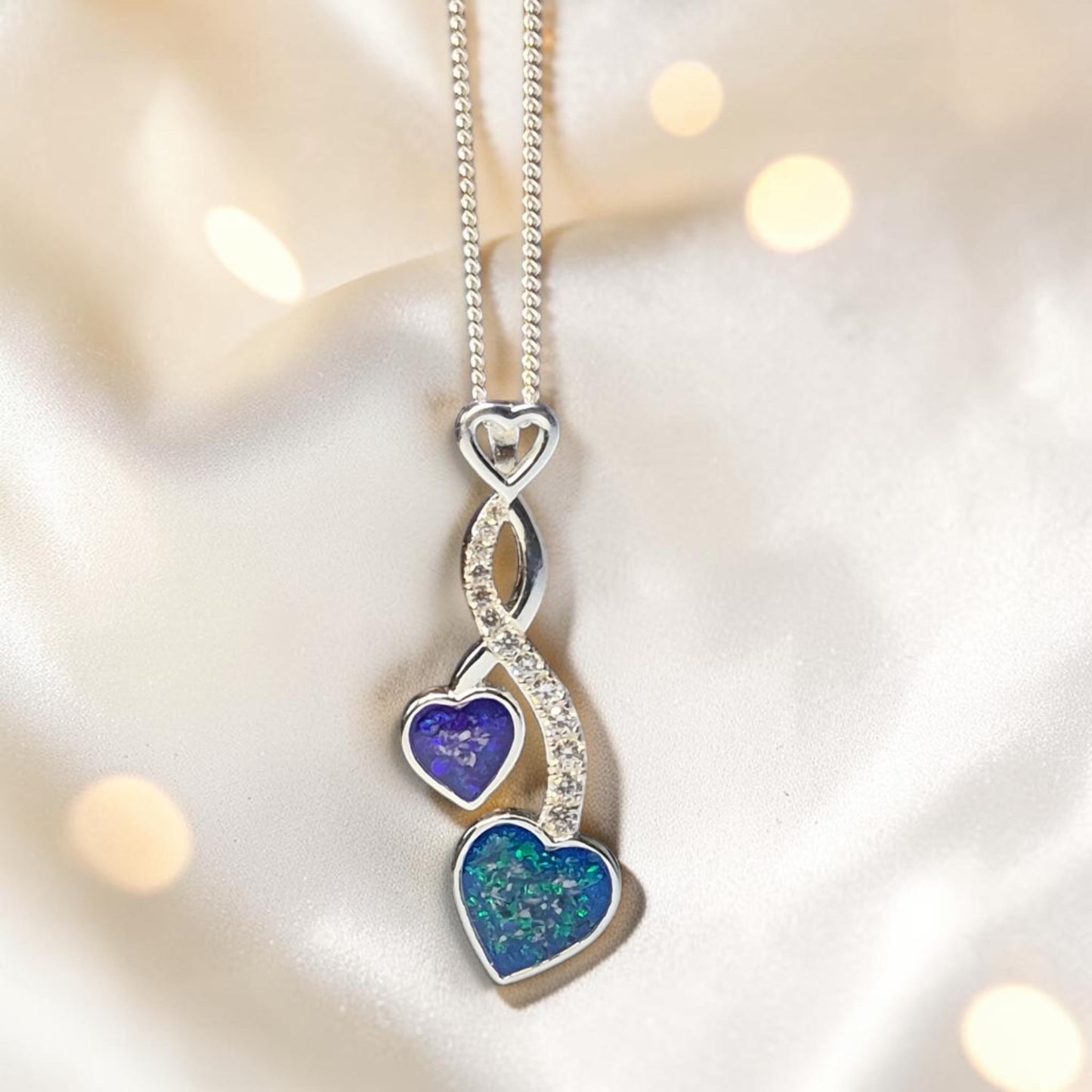 Silver twin heart  memorial ashes pendant, handcrafted in the uk