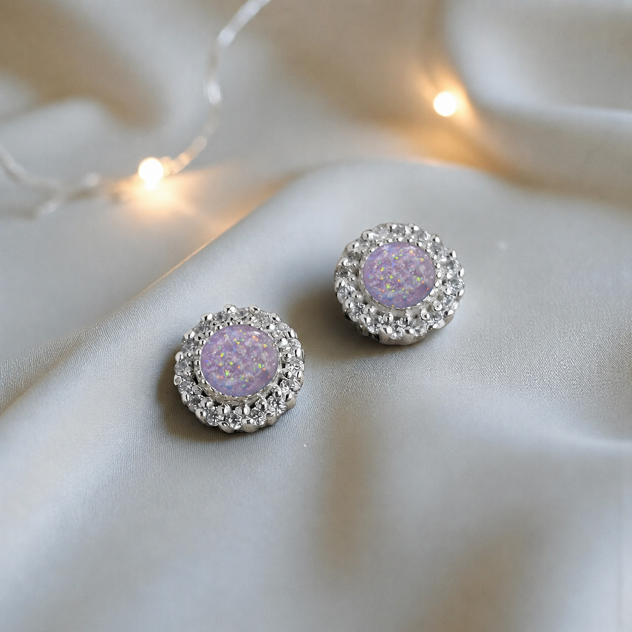 Halo's memorial stud earrings in Unicorn Purple opal — sterling silver, handcrafted in Lancashire, UK