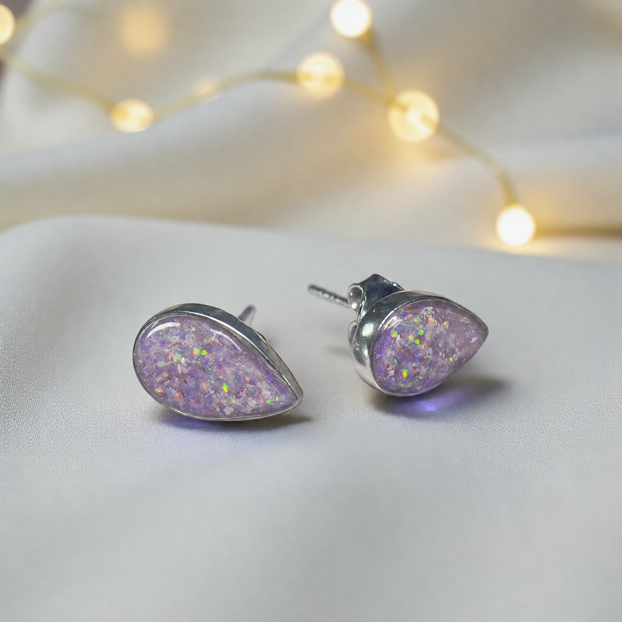 Pure Radiance memorial earrings in Unicorn Purple opal — sterling silver, handcrafted in Lancashire, UK