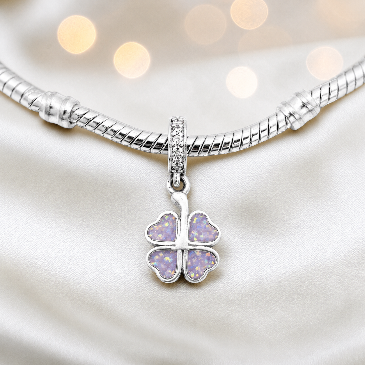 Unicorn purple sterling silver clover dangle ashes memorial charm, handcrafted in Lancashire by keepsake memorial