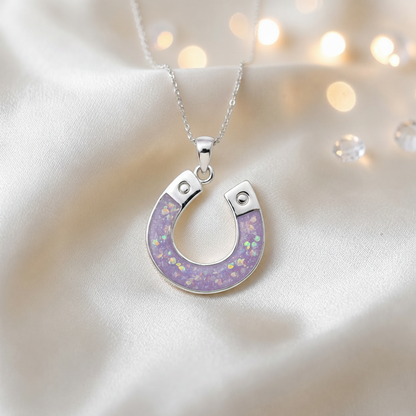 Midnight horseshoe ashes pendant in unicorn purple, handcrafted in Lancashire UK - by Keepsake Memorial Jewellery