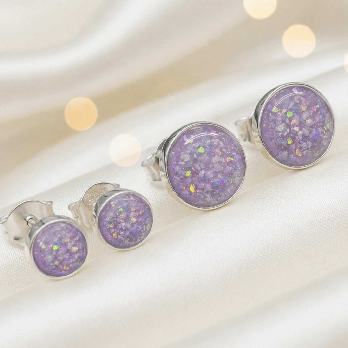 Radiance Earrings — silver round ashes memorial stud earrings in Unicorn Purple resin, handcrafted in Lancashire, UK