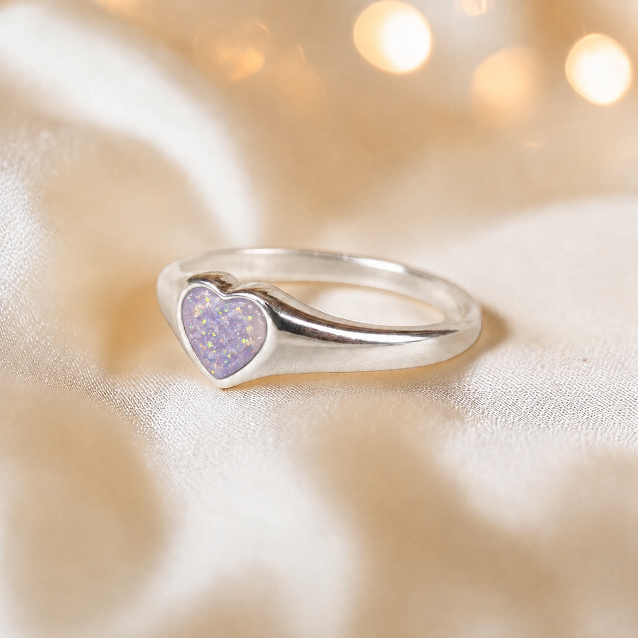 Eden Heart shaped memorial ashes ring in unicorn purple,  handcrafted in Lancashire, UK.