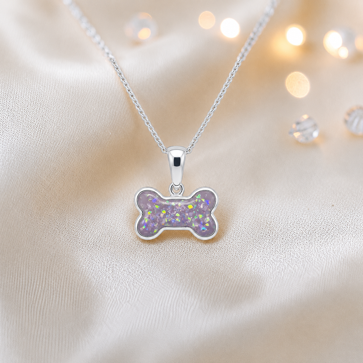 Unicorn purple Milo sterling silver dog bone memorial pendant, handcrafted in Lancashire UK by Keepsake Memorial Jewellery